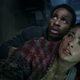 Andre Holland and Natalie Martinez in the Jurassic World short film Battle at Big Rock.